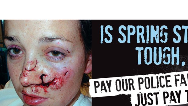 The Police Association has launched a graphic billboard as it pressures the state government for a wage increase.