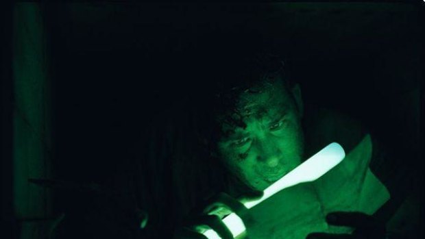 Ryan Reynolds needs a better night light in the taut underground thriller Buried.