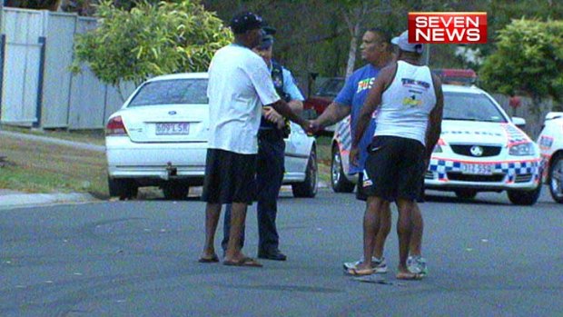 Members of the rival groups shake hands, ending another eruption of violence.