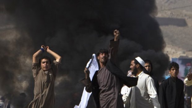 Anger and mayhem ... Afghan protesters chant "death to America" in clashes with police in Kabul.