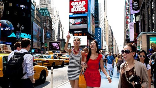 Miss China, Luo Zilin, takes in the sights of New York's Times Square.