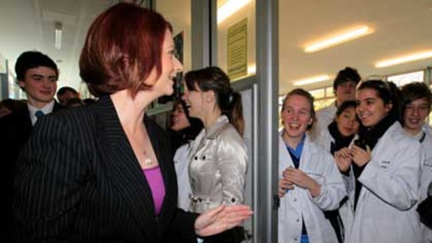 Prime Minister Julia Gillard with students at her old school, Unley High School, in Adelaide.