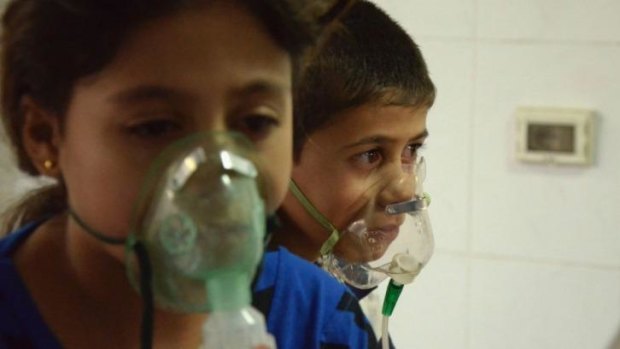 Children receive treatment after the chemical attack on the outskirts of Damascus in August 2013.