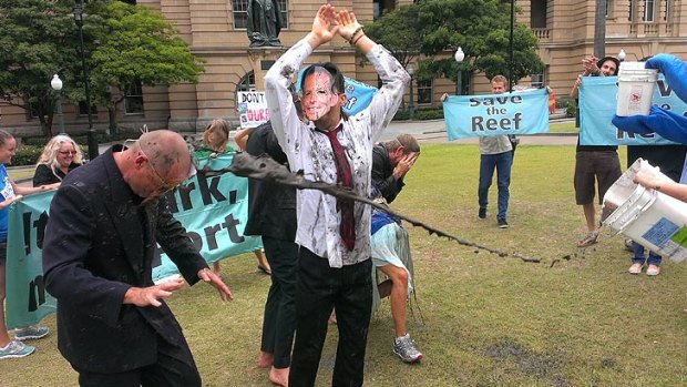 Conservation groups protest the approval of the Abbot Point coal terminal expansion in Queens Park, Brisbane.