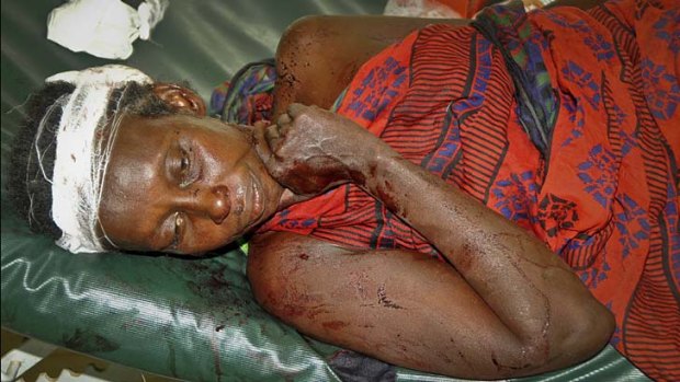 An injured woman is treated at the district hospital in Malindi following tribal clashes.