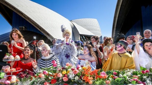 Opera Australia performers raise their glasses after performing <i>Happy Birthday</i> at the 2016 season launch and 60th birthday celebrations.