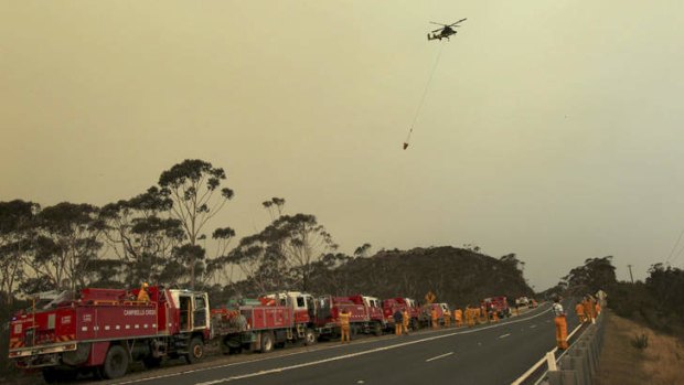 Emergency declared: An RFS team on the Bells Line of Road near Mt Victoria on Sunday.