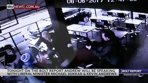 CCTV footage shows Andrew Bolt being set upon by protesters outside a book launch in Melbourne on Tuesday.
