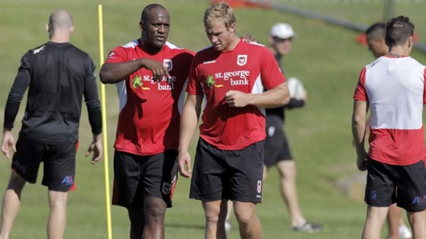 A friendly word &#8230; Matt Prior chats to Wendell Sailor at training.