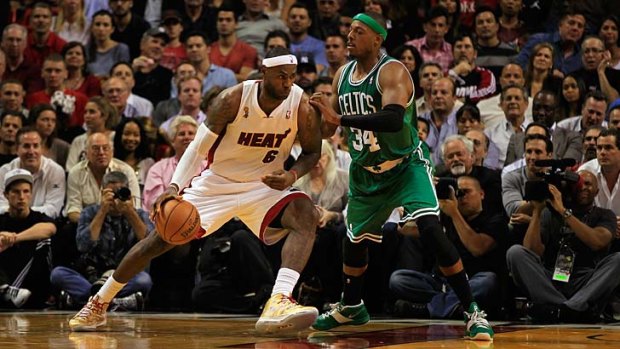 LeBron James attempts to get past Paul Pierce of the Boston Celtics.