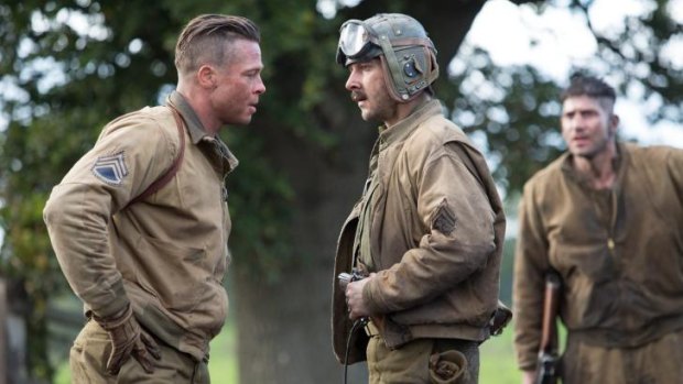 Lovable rogue: Wardaddy (Brad Pitt) and Boyd 'Bible' Swan (Shia LaBeouf) in <i>Fury</i>.