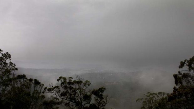 No picnic ... the view of the Lockyer Valley from Picnic Point during yesterday's thunderstorm.