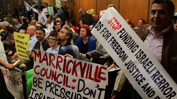 Push and pull ... residents for and against the boycott against Israel gathered in the Marrickville Council chambers for the meeting on Tuesday.