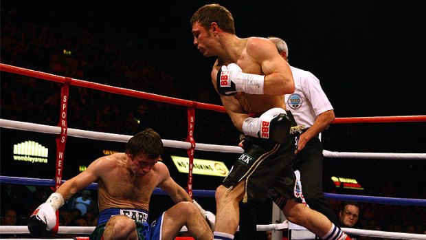 Toowoomba's Michael Katsidis knocks down England’s Graham Earl at Wembley in 2007.