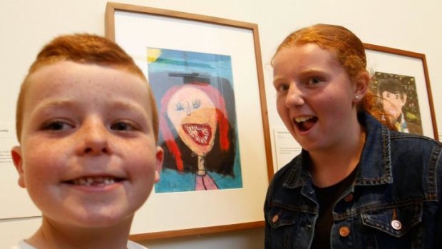 Artist and model: Daniel Harford, with his Young Archie-winning portrait and its subject, his sister Kasey.