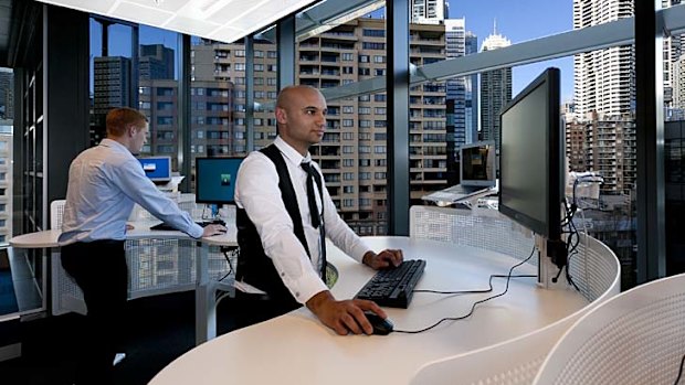 Standing workspaces at Commonwealth Bank.