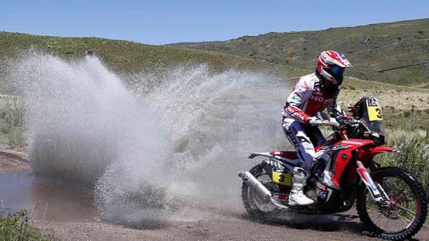 Joan Barreda rides his Honda during the first stage.