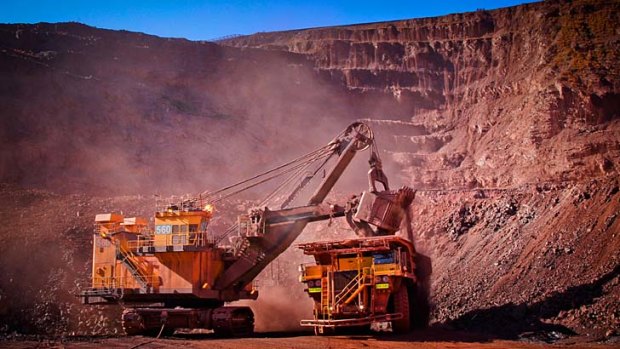 Pointing down: Analysts believe the iron ore price is set to drop in the last quarter of 2013.