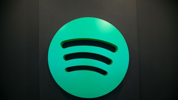 A Spotify Ltd. logo sits on display inside the music streaming company's offices in Berlin, Germany, on Friday, June 17, 2016. According to reports, Spotify has hired Paul Vogel, the former equity research analyst at Barclays Plc, indicating that the music streaming company may be planning making an initial public offering. Photographer: Krisztian Bocsi/Bloomberg
