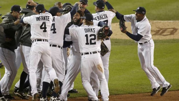 Detroit players celebrate the series win.
