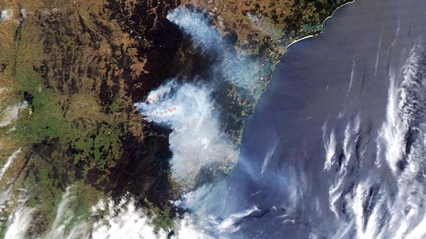 Fires burning near Sydney: Satellite image shows bluish smoke - the location of the bushfires.