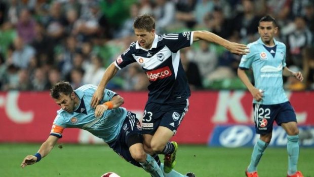 Alessandro Del Piero of Sydney and Adrian Leijer of the Victory contest the ball during the round 25 match at AAMI Park on Saturday.