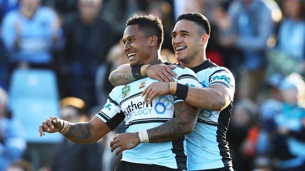 Ben Barba celebrates a try with teammate Valentine Holmes.
