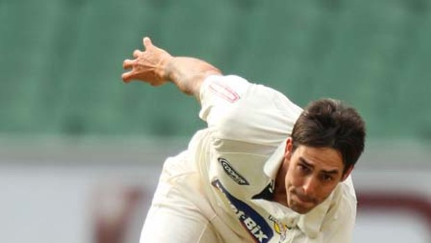 On fire . . . Mitchell Johnson has scored a century and claimed five wickets for Western Australia against Victoria at the MCG.