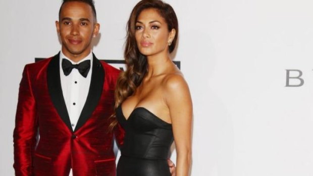 Lewis Hamitlon with partner Nicole Scherzinger at a charity ball in France this week.