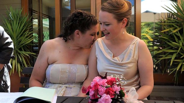 Wedded kiss: Ellie Filler, left, and Emily Jehne at their wedding on Sunday.