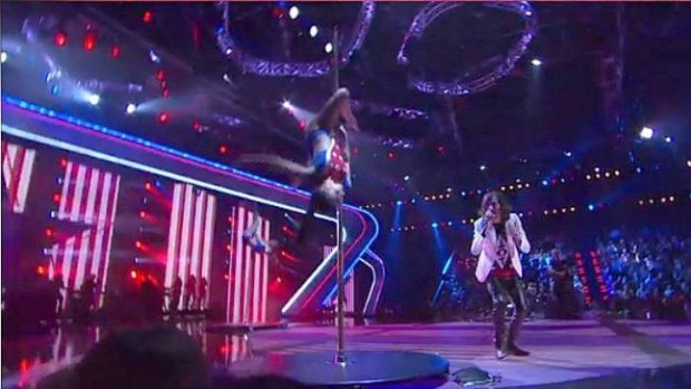 Frank Lakoudis performing <i>American Woman</i> on <i>The Voice</i> drew ire over pole dancers.