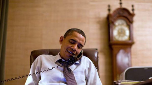 Loser ... President Barack Obama makes an election night phone call from the White House.