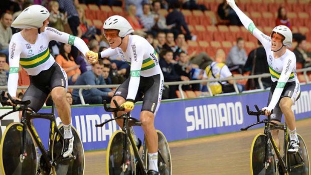 Shining lights ... Australia’s men’s team celebrates  victory in the team pursuit at the track world championships in Minsk. They defeated old rivals Great Britain in the final.