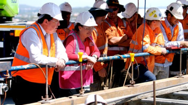 Deputy Premier Paul Lucas and Premier Anna Bligh survey the work on the new Gateway Bridge.
