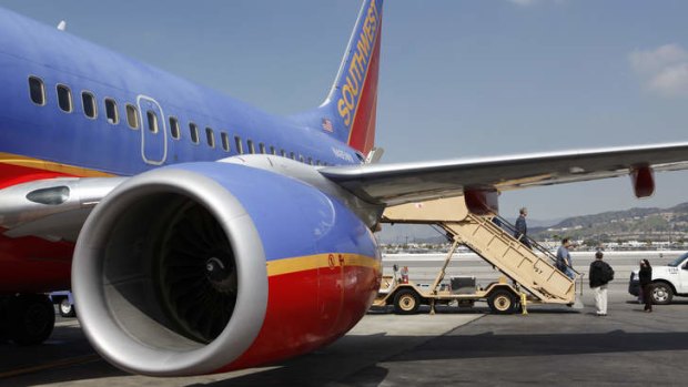 'It was pretty scary' ... The Southwest Airlines flight was heading to Los Angeles before being diverted to Omaha, Nebraska after a 23-year-old man tried to open a door.