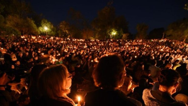 Students gather for a candlelight vigil on the University of California Santa Barbara campus.