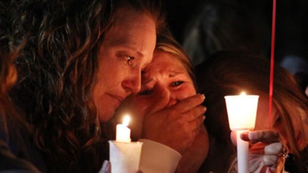 Vigil ... Ronnie Lee Gardner's daughter, Brandie Gardner, right, is comforted by close friend Debbie Evans.
