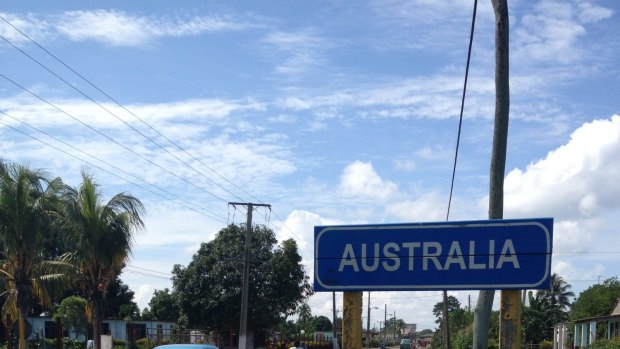 A street sign welcomes visitors to Australia, Cuba.