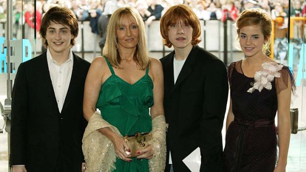 End of an era ... Daniel Radcliffe, Rupert Grint and Emma Watson, pictured with writer J K Rowling at the UK Premiere of "Harry Potter And The Prisoner Of Azkaban" in May 2004.