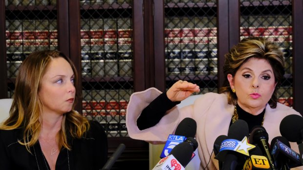 Attorney Gloria Allred, right, talks during a news conference with her client Louisette Geiss, left, an alleged sexual harassment victim of entertainment executive Harvey Weinstein.