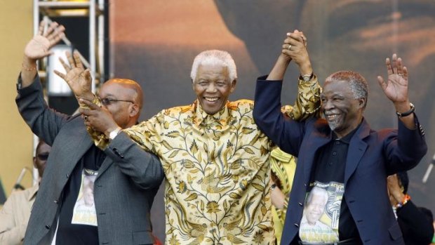 Nelson Mandela with current South African President Jacob Zuma (L) and former president Thabo Mbeki