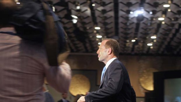 Hope ... Tony Abbott at the party meeting in Melbourne yesterday.