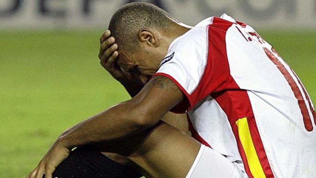 Knocked out ... Sevilla's Luis Fabiano will not be playing in the Champions League group stages this season.
