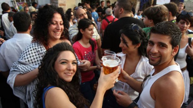 In the mix ... locals and visitors with their pints.