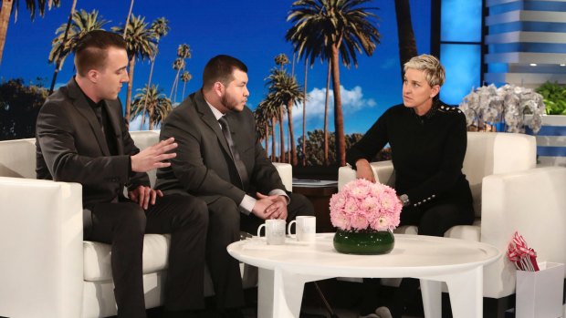 Stephen Schuck, left, and Jesus Campos appear with host Ellen Degeneres during a taping of "The Ellen DeGeneres Show"