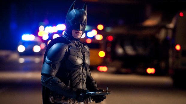 Up in arms: Film industry officials say the laws could prevent them from using the lifelike weapons they have employed in films such as <i>The Dark Knight Rises</i>.