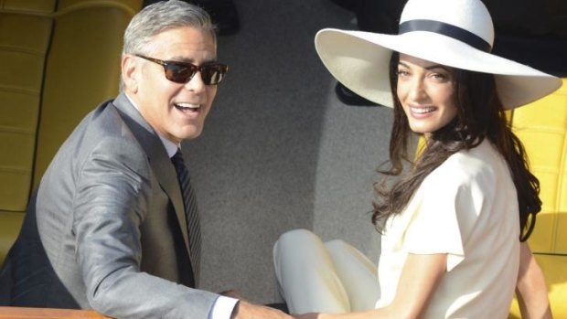 George Clooney and Amal Alamuddin after their civil marriage ceremony in Venice, Italy.