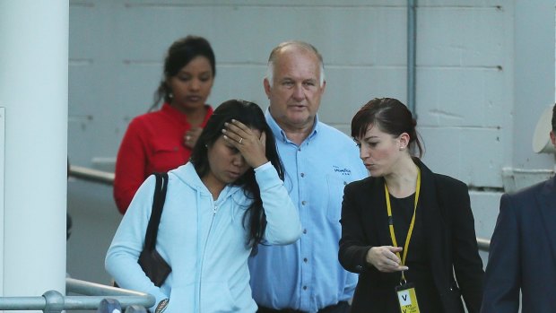 Febyanti Herewila, widow of Andrew Chan, arrives at Sydney International Airport. 