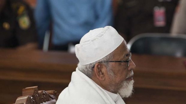 Reality bites ... Abu Bakar Bashir listens to judges deliver their verdict in a Jakarta court yesterday.