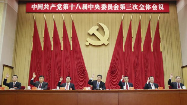 Reforms: Chinese President Xi Jinping (centre) with other leaders at the Communist Party plenary meeting last week.